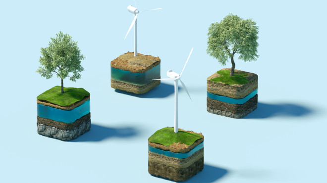 Würfel mit Grass, Bäumen und einer Windturbine